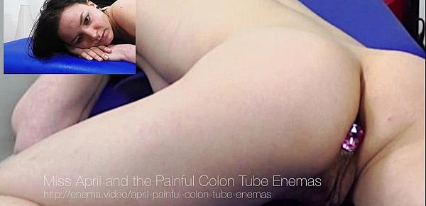  Miss April Takes a Painful Enema with a Series of Challenging Colon Tubes